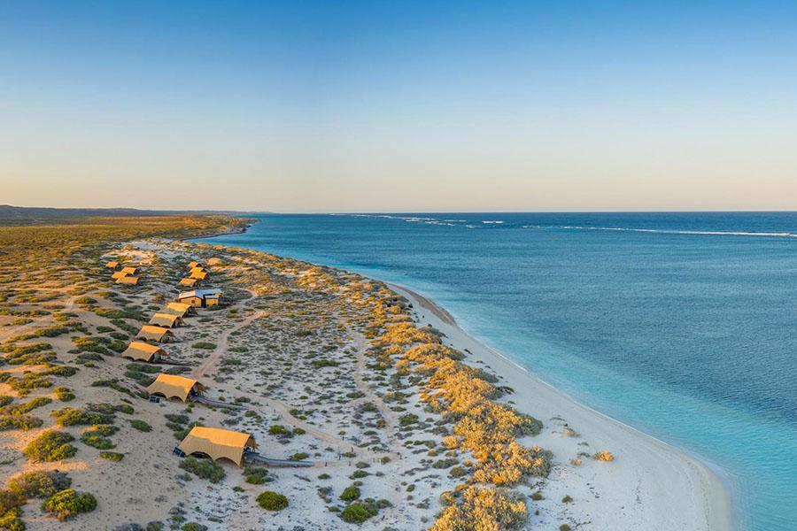 Soak up the stunning beachside views from Sal Salis on the Ningaloo Reef | Photo credit: Sal Salis