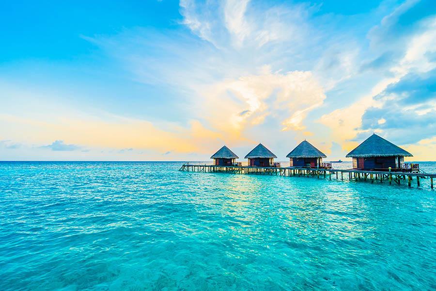 Swim in the blue waters of the Maldives
