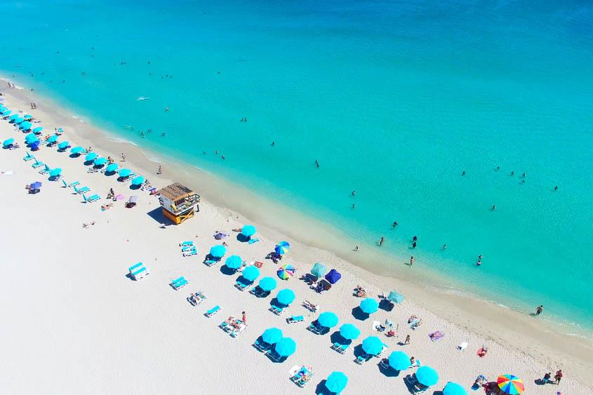 Blue parasols on South Beach, Miami, Florida