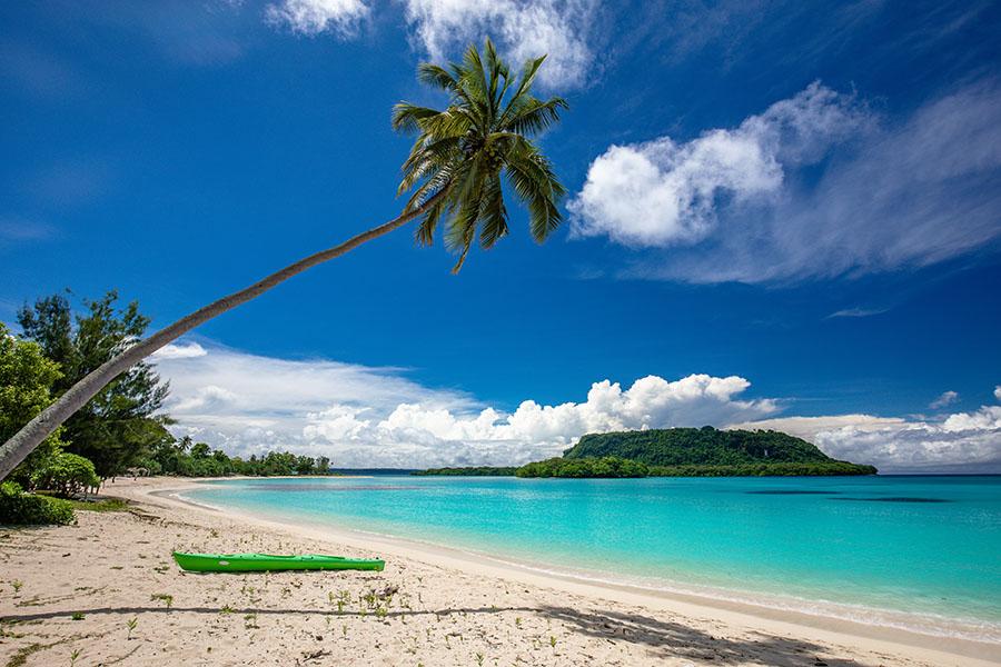 Relax on the pristine beaches in Port Orly | Travel Nation 