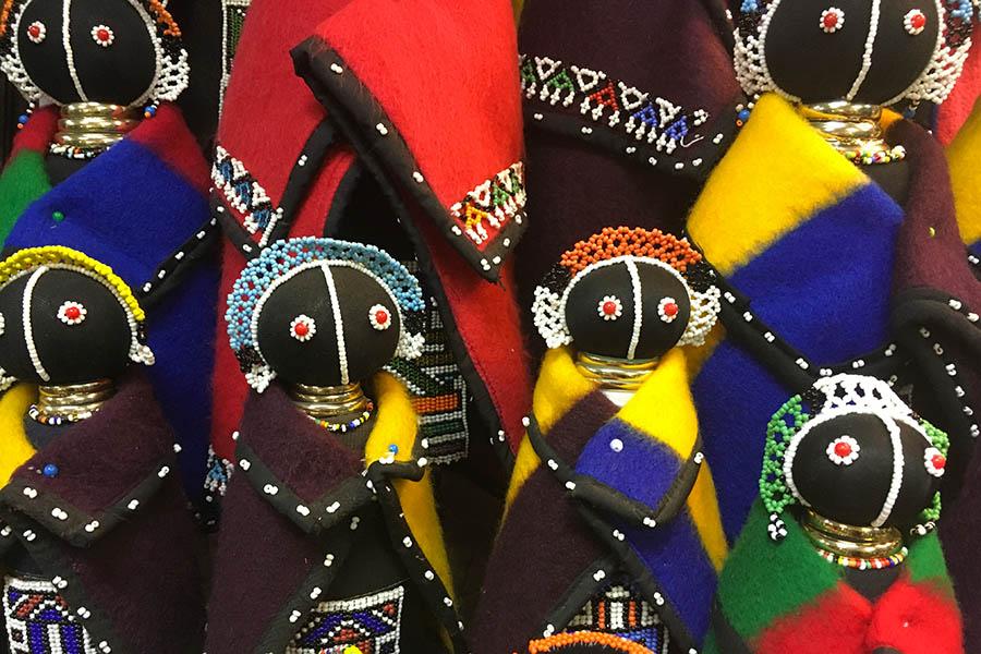 Bring back a colourful doll as a souvenir