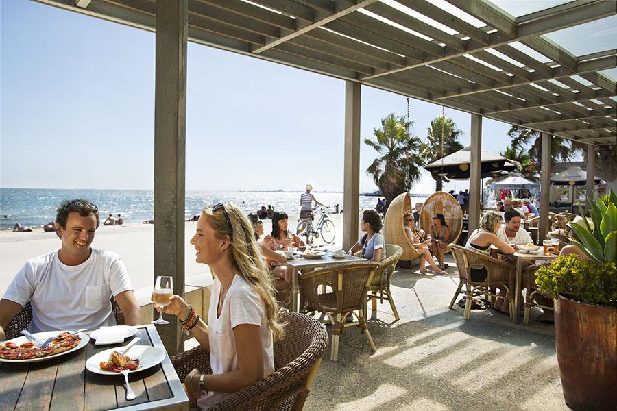 Head out to the popular suburb of St Kilda for a drink by the beach