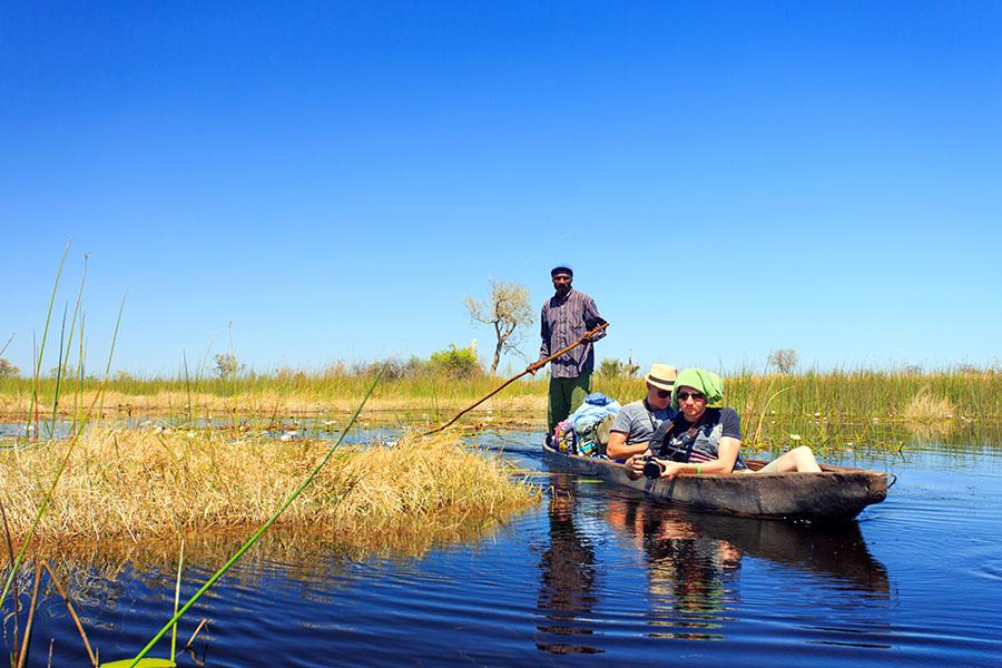 Cruise through the Okovango Delta in a traditional mokoro canoe