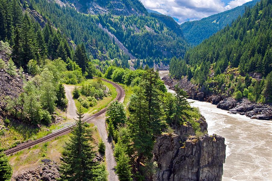 Heading out of Vancouver, Chris and Debs cycle alongside the Fraser River