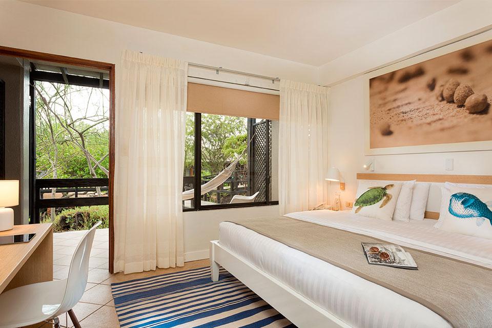 Explore the diverse Galapagos Islands without sleeping on a boat!