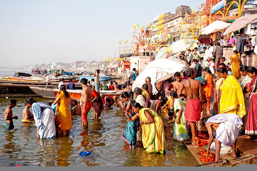 People bathing in the River Ganges, Varanasi, India