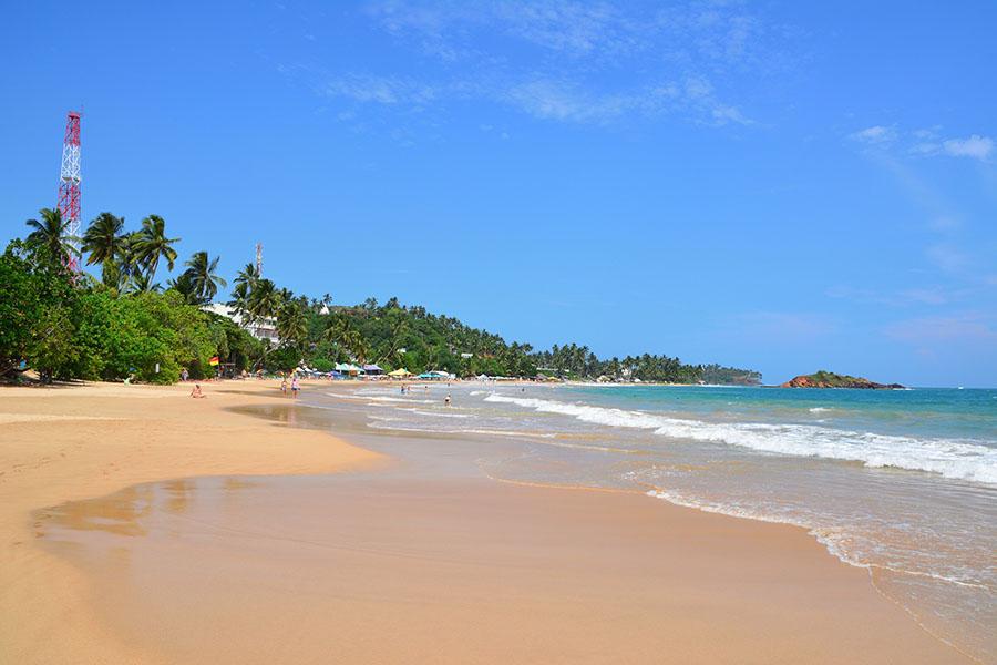 Even if you’re not keen on boats, you can easily relax on the golden beach while the rest of your party goes out on the water