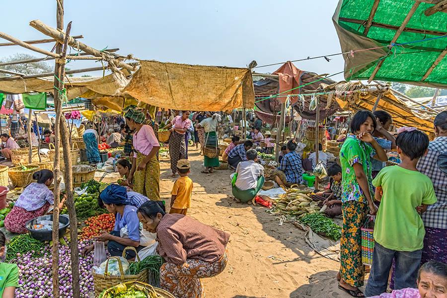 Mingle with the locals at the food markets along the banks of the Yangon River
