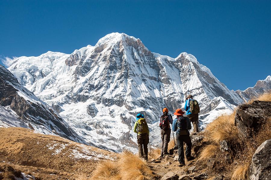 The stunning peaks of the Himalayas stand before you