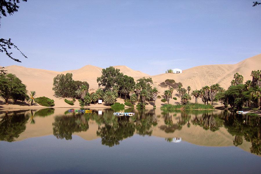 Huacachina is built around a desert oasis and towering sand dunes 