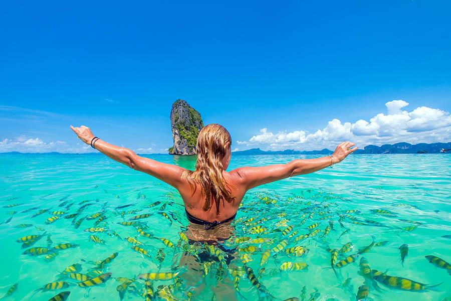 Woman swimming in the Andaman Sea