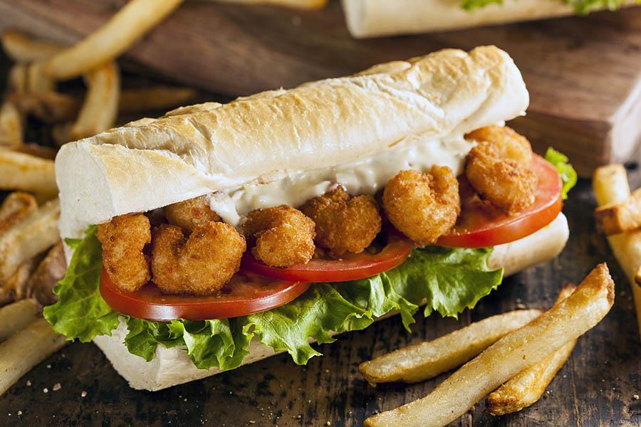 Tuck into a traditional Louisiana po'boy sandwich